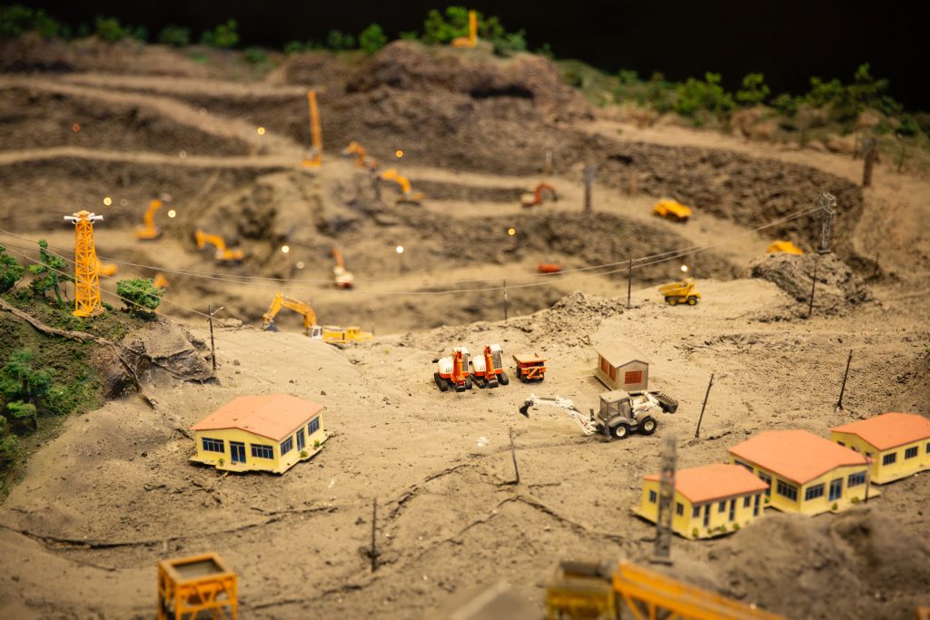Photo by HONG SON: https://www.pexels.com/photo/miniature-construction-site-with-various-equipment-4160347/